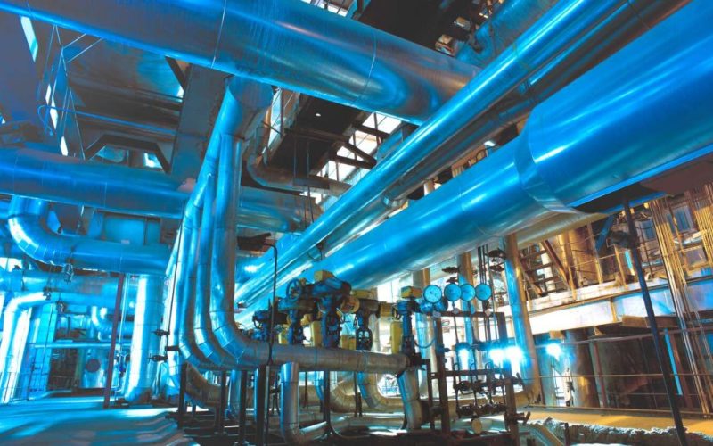 Industrial-and-Industries-Served-Main-Page Industrial setting with many pipes