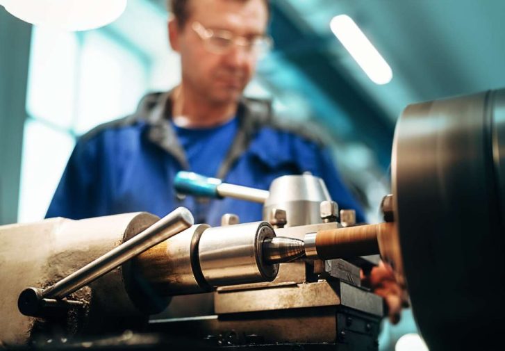 lathe-in-production-hall-processing-of-metal-products-image Lathe in Production Hall Processing of Metal Products Image